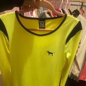 Two large neon pink long sleeve shirts